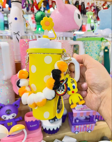 Cute & Playful Polka Dot Yellow Tumbler with Tweety Bird Charm & Pom-Pom Strap